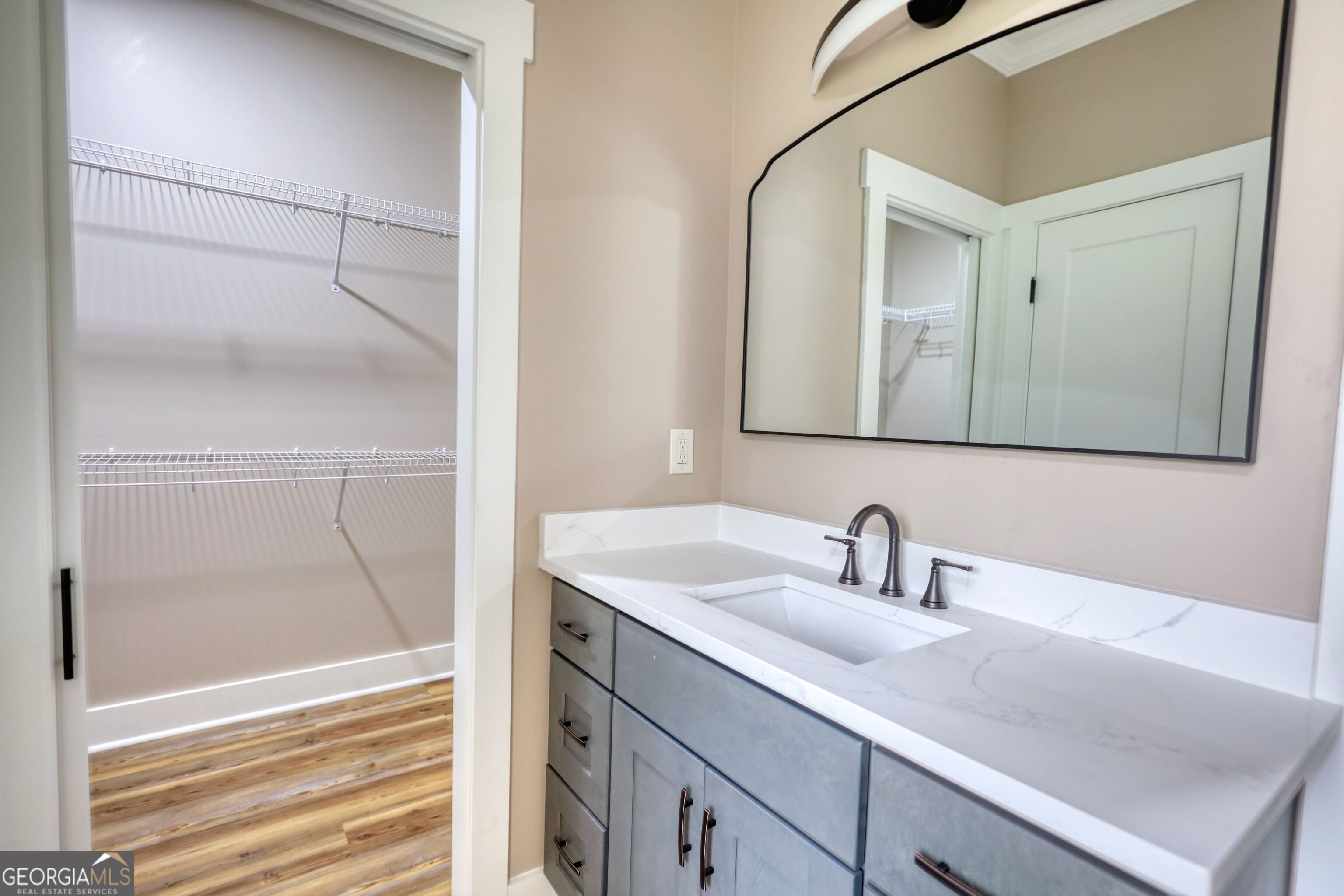 2941 Old Buckhead Road Madison, GA 30650 - Photo 35 of 58 a bathroom with a sink and a mirror