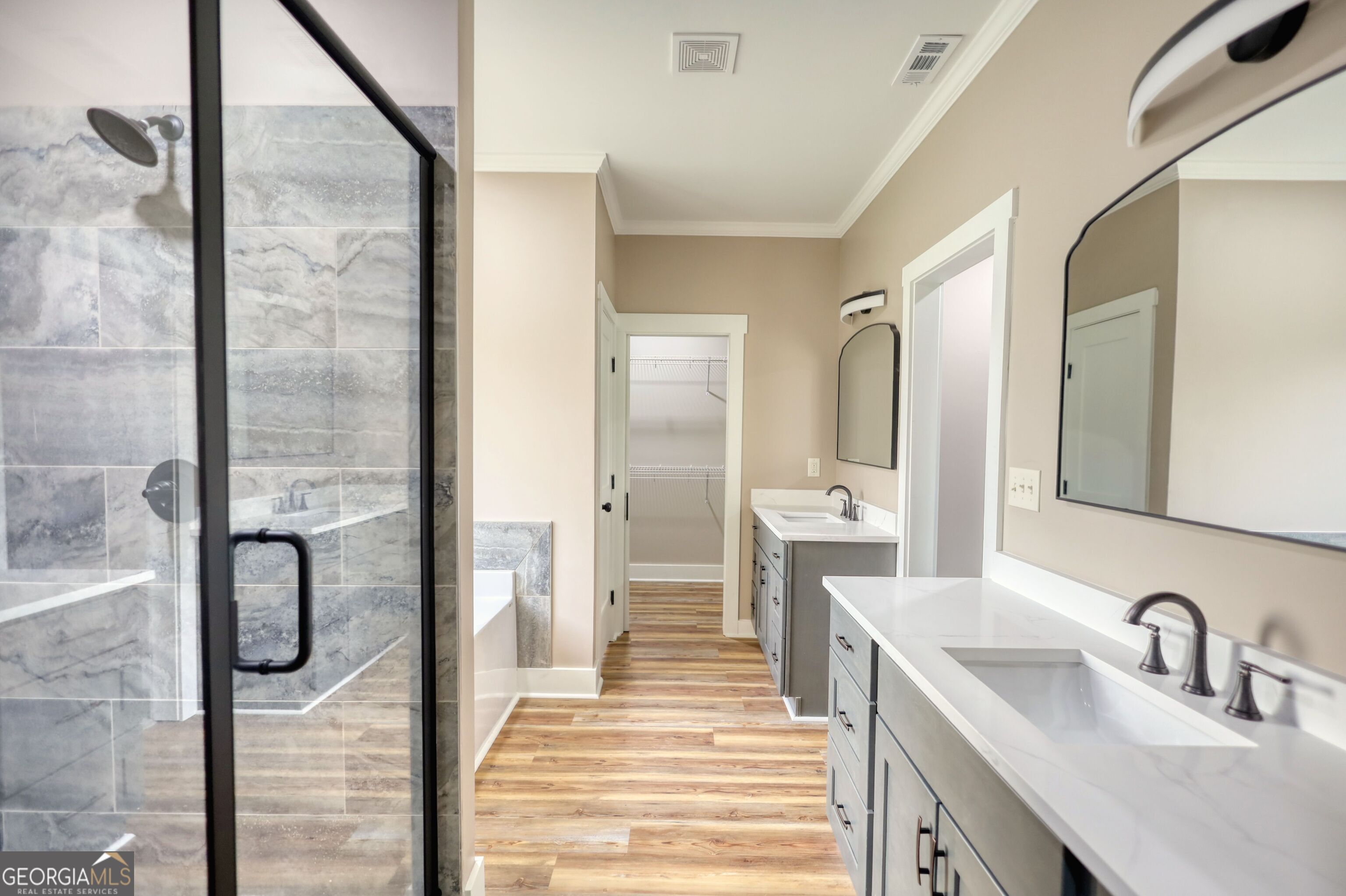 2941 Old Buckhead Road Madison, GA 30650 - Photo 39 of 58 a bathroom with a sink and a mirror