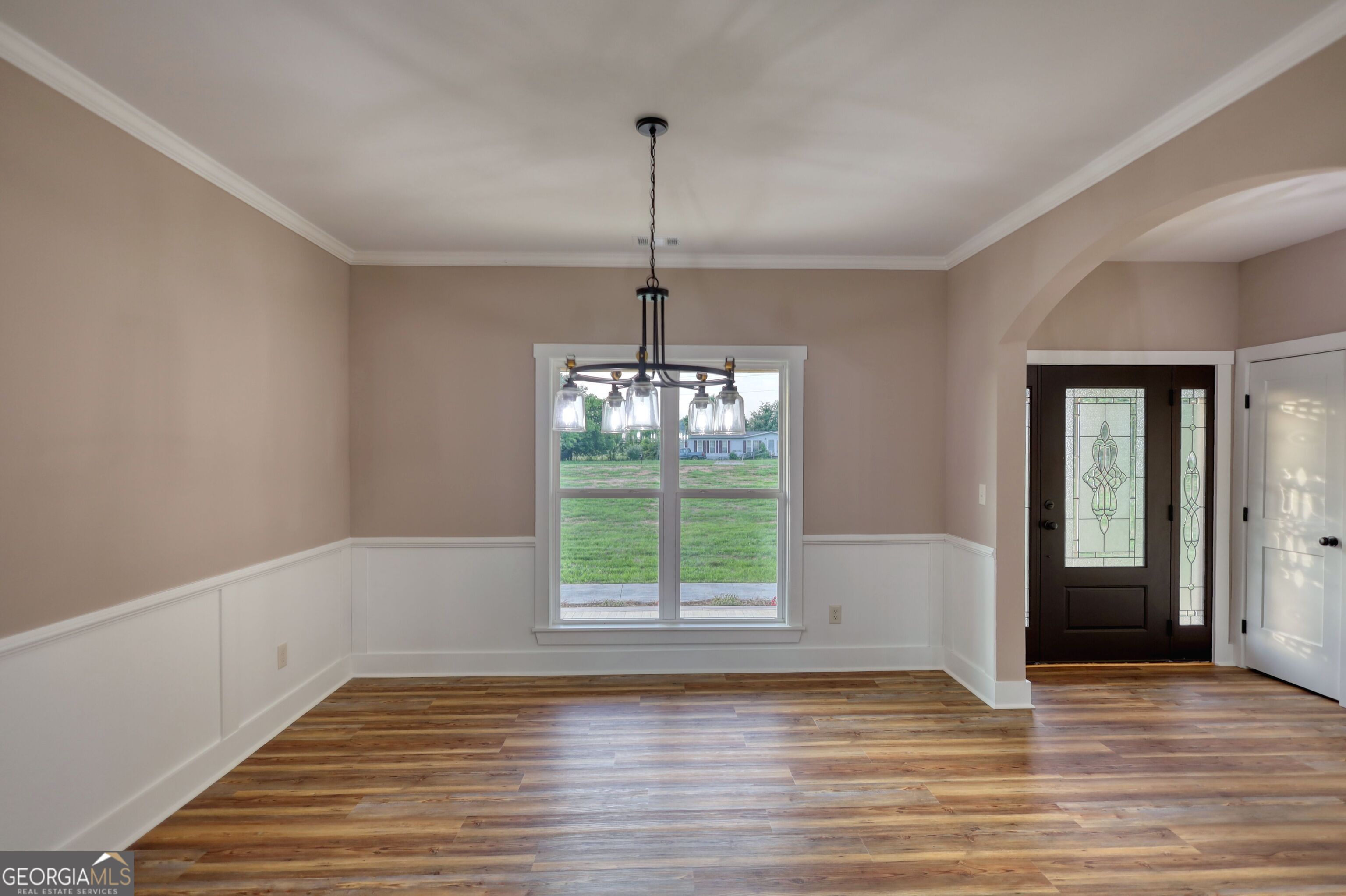 2941 Old Buckhead Road Madison, GA 30650 - Photo 4 of 58 a view of empty room with wooden floor and fan