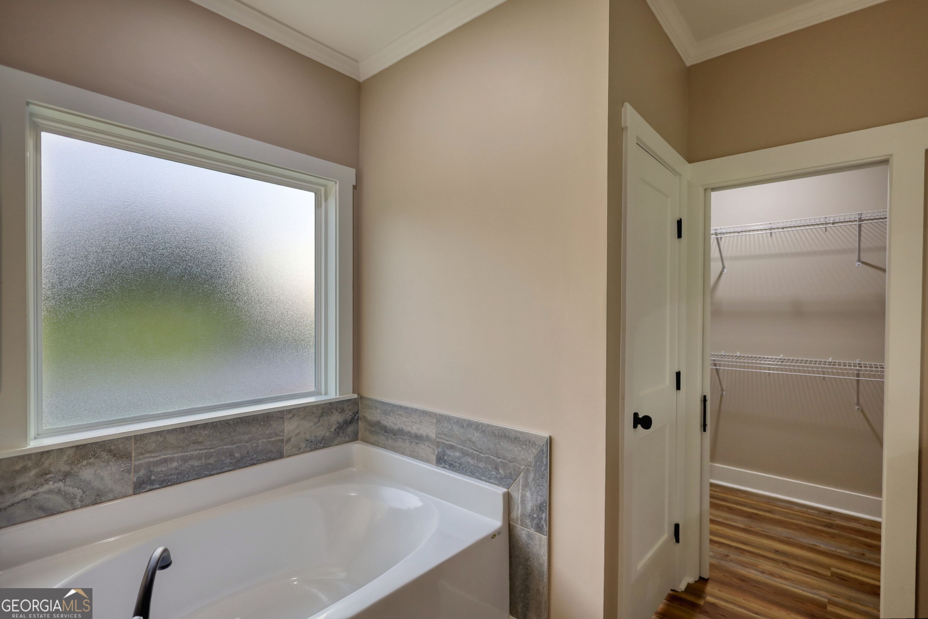 2941 Old Buckhead Road Madison, GA 30650 - Photo 41 of 58 a bathroom with a bathtub and a shower
