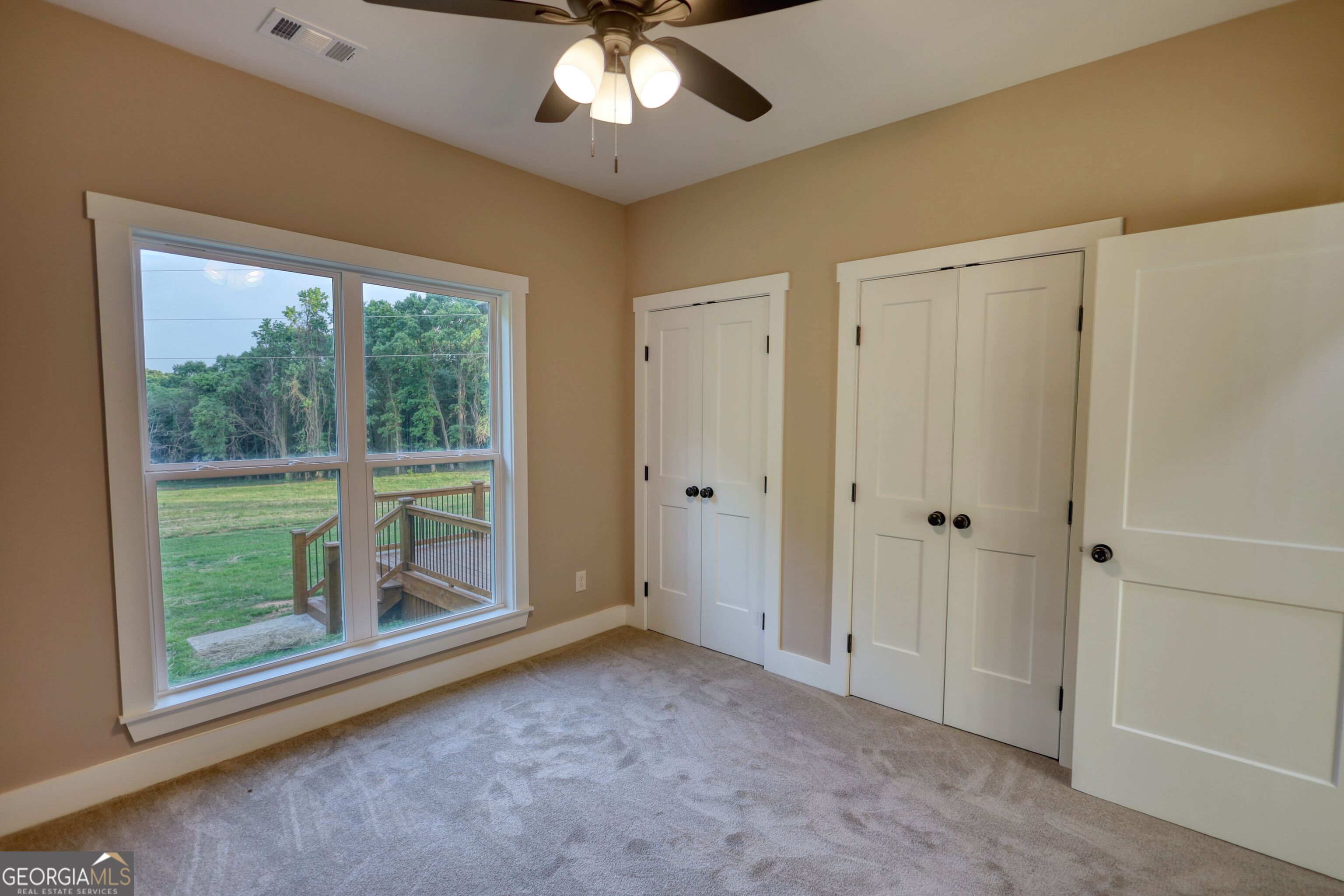 2941 Old Buckhead Road Madison, GA 30650 - Photo 43 of 58 a view of room with window and ceiling fan