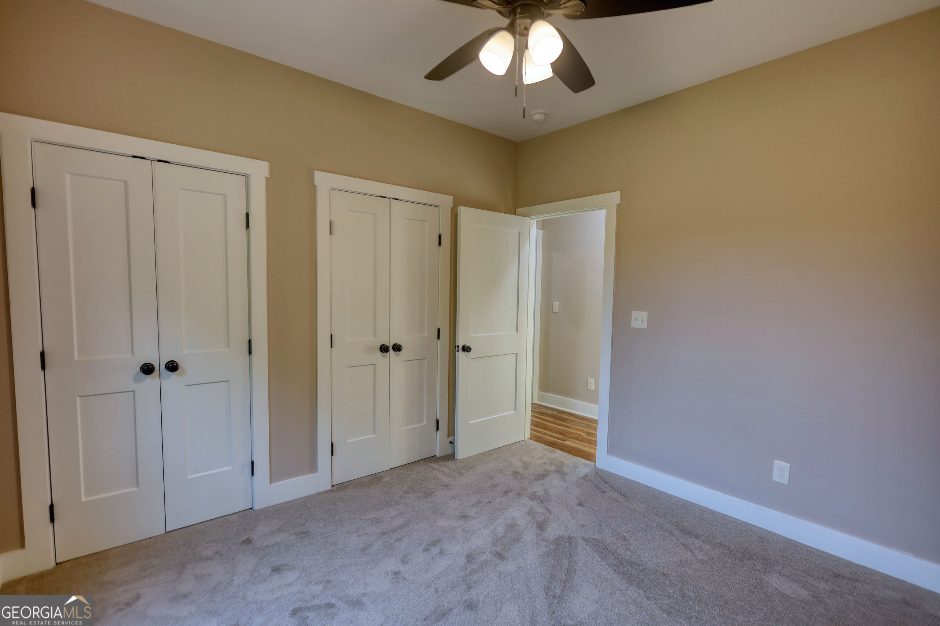 2941 Old Buckhead Road Madison, GA 30650 - Photo 44 of 58 a view of an empty room with a chandelier fan