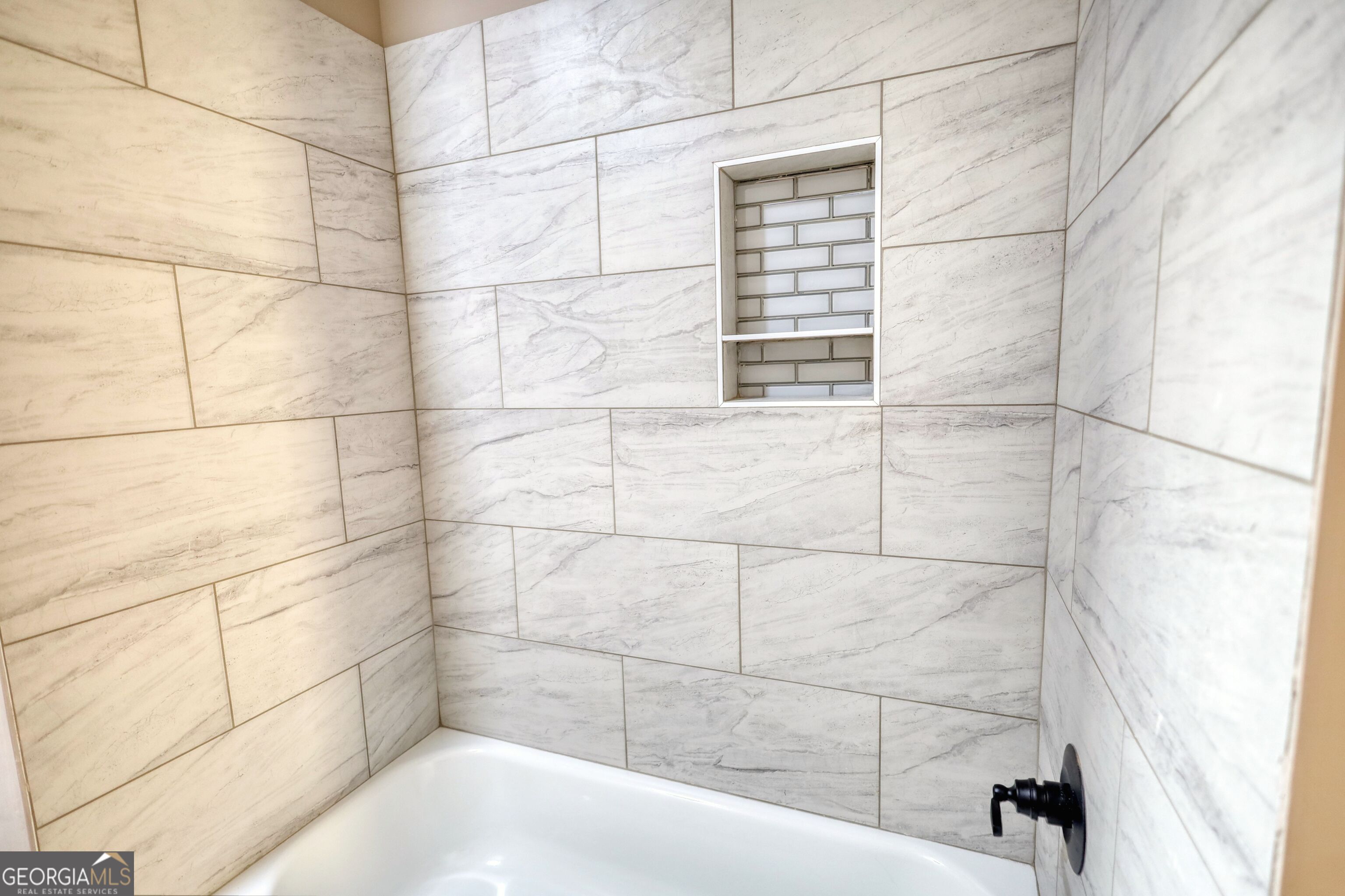 2941 Old Buckhead Road Madison, GA 30650 - Photo 46 of 58 a bathroom with a bathtub