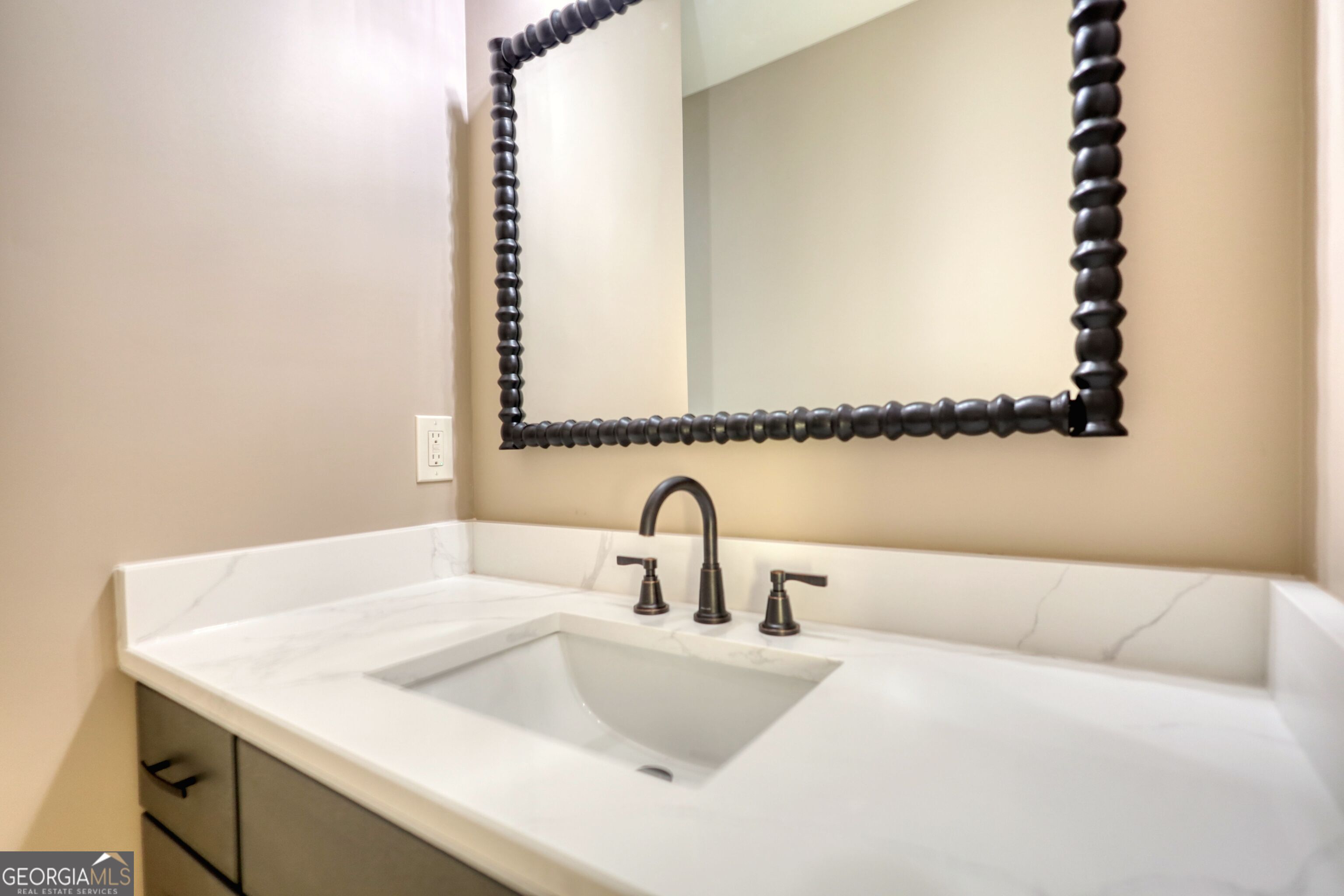 2941 Old Buckhead Road Madison, GA 30650 - Photo 47 of 58 a bathroom with a sink and a mirror