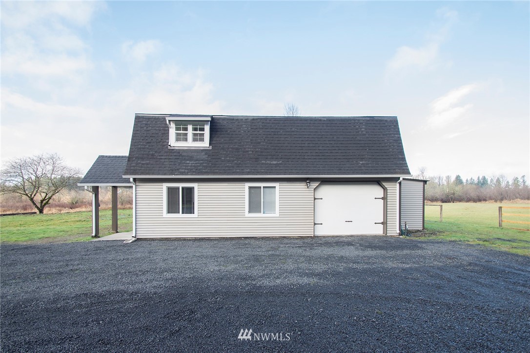 15941 Littlerock Road Southwest Rochester, WA 98579 - Photo 2 of 31 a view of a house with a yard