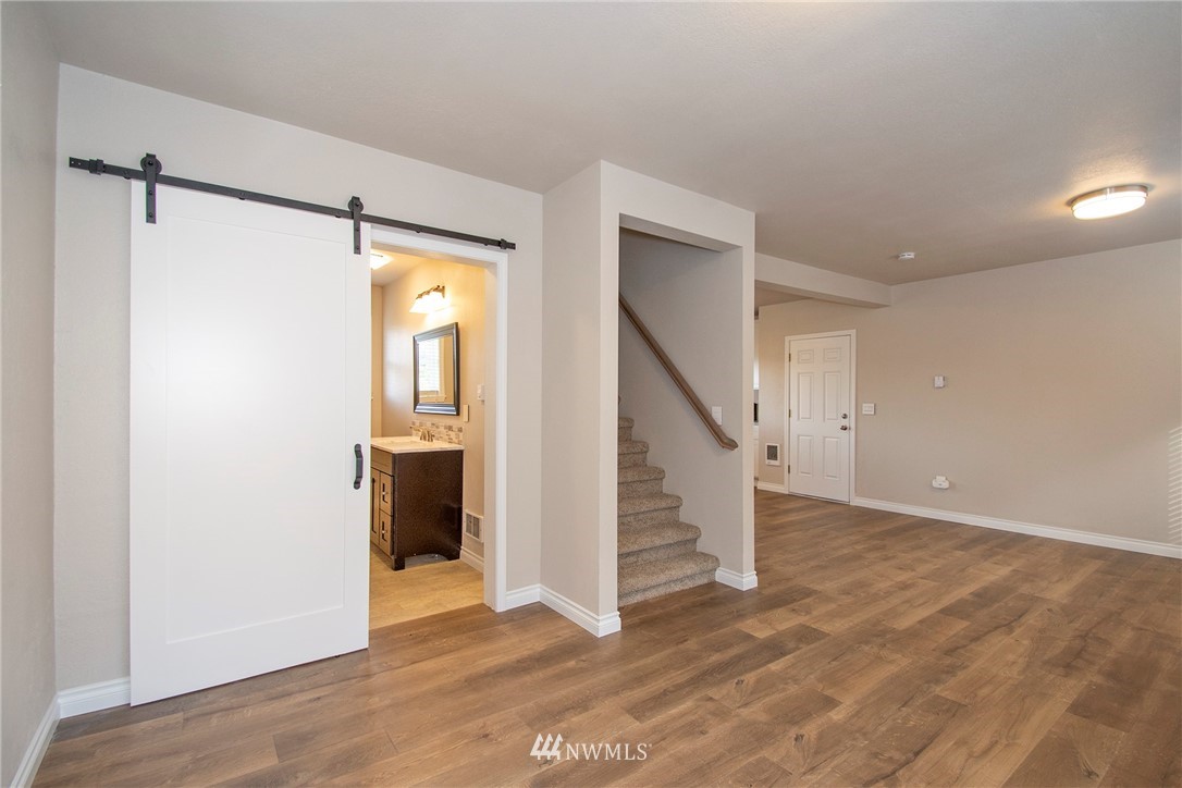 15941 Littlerock Road Southwest Rochester, WA 98579 - Photo 12 of 31 a view of entryway with wooden floor