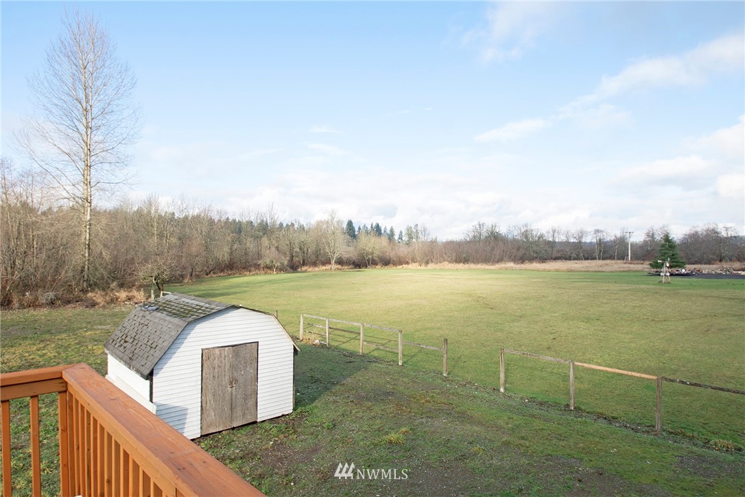 15941 Littlerock Road Southwest Rochester, WA 98579 - Photo 26 of 31 a view of a lake from a yard