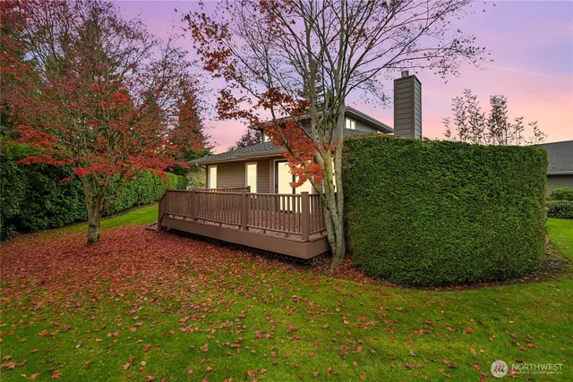 a view of a house with a back yard