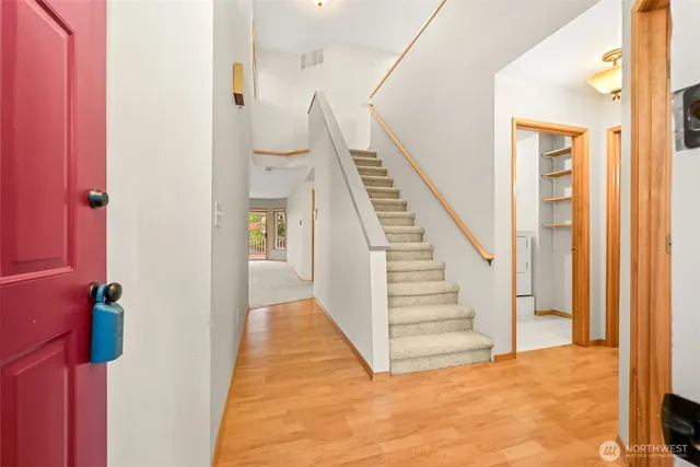 a view of a hallway with staircase