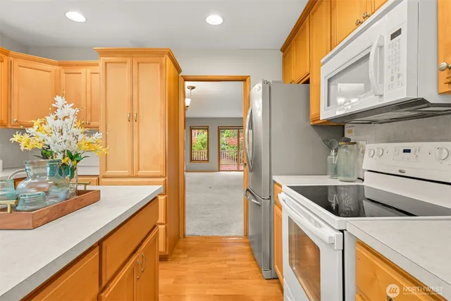 a kitchen that has a sink and cabinets