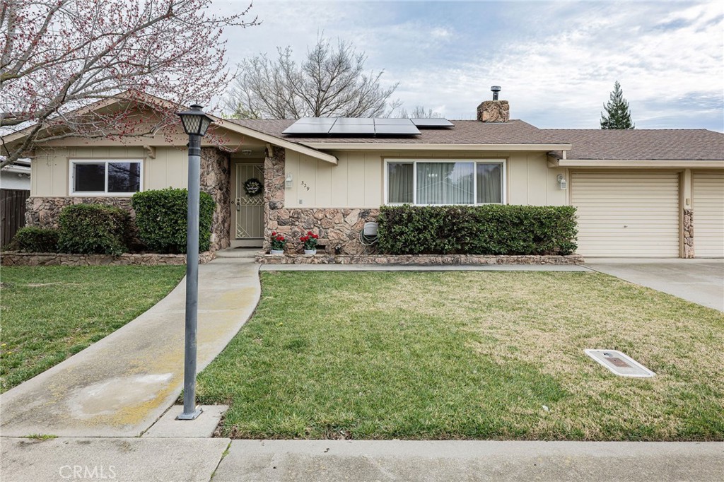 329 Byron Way Orland, CA 95963 - Photo 1 of 35 a front view of house with yard and green space