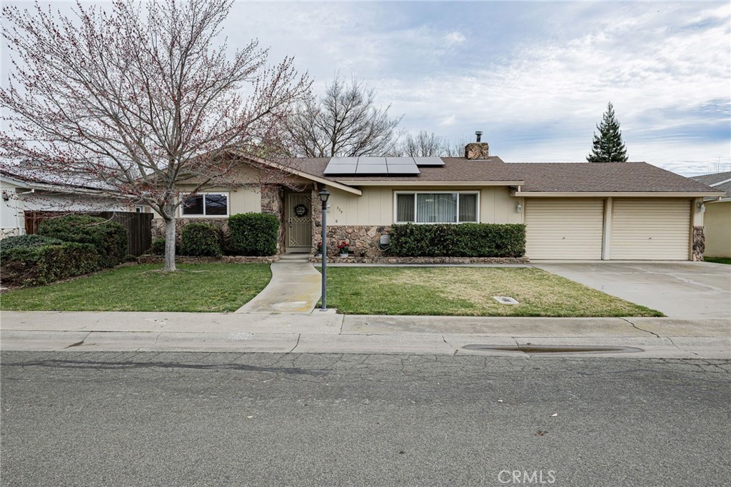 329 Byron Way Orland, CA 95963 - Photo 2 of 35 a view of a house with a yard and large tree
