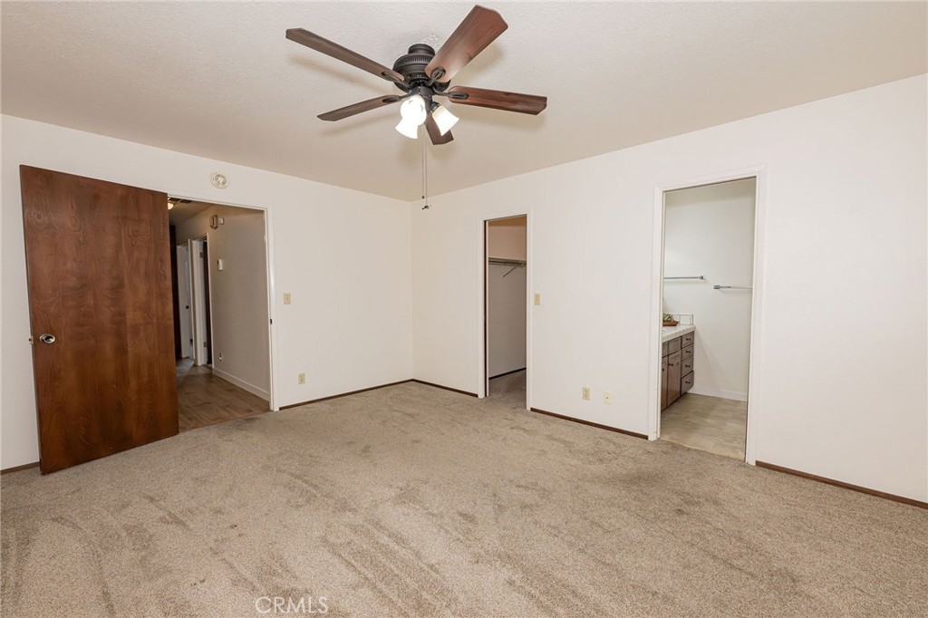 329 Byron Way Orland, CA 95963 - Photo 22 of 35 an empty room with closet and a ceiling fan