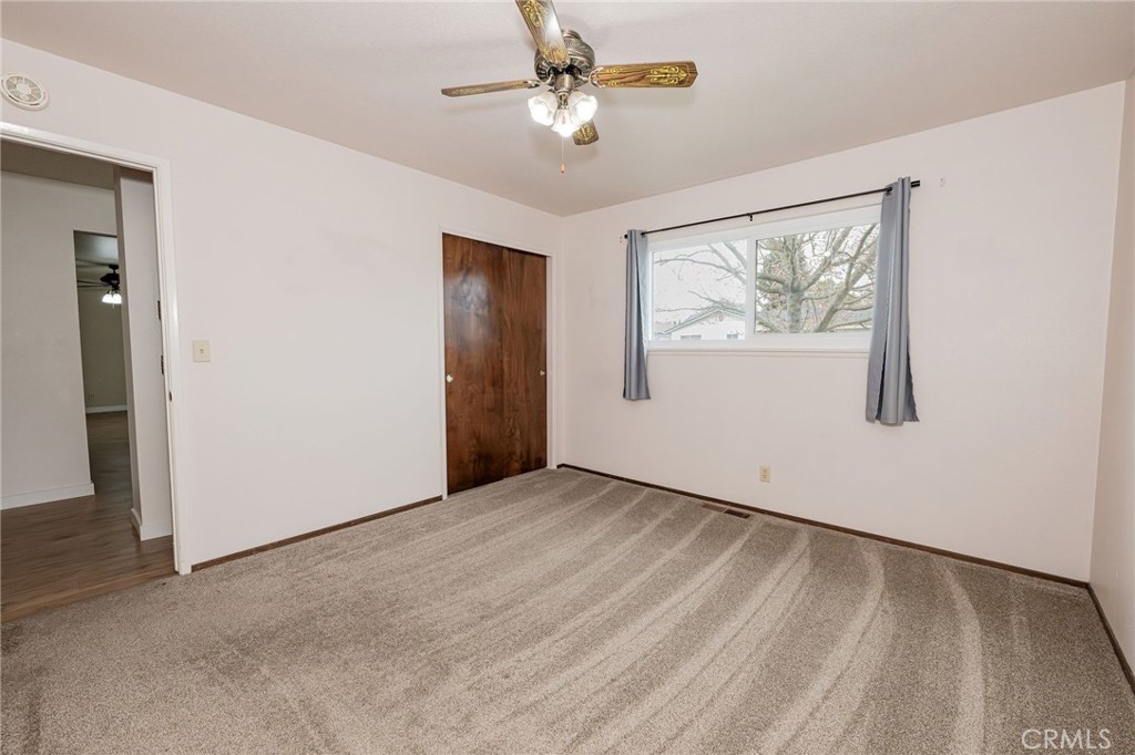 329 Byron Way Orland, CA 95963 - Photo 26 of 35 an empty room with windows and fan