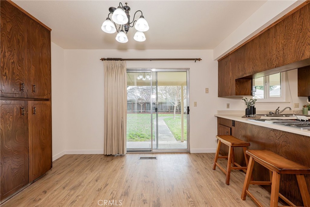 329 Byron Way Orland, CA 95963 - Photo 8 of 35 a view of a dining room with furniture window and wooden floor