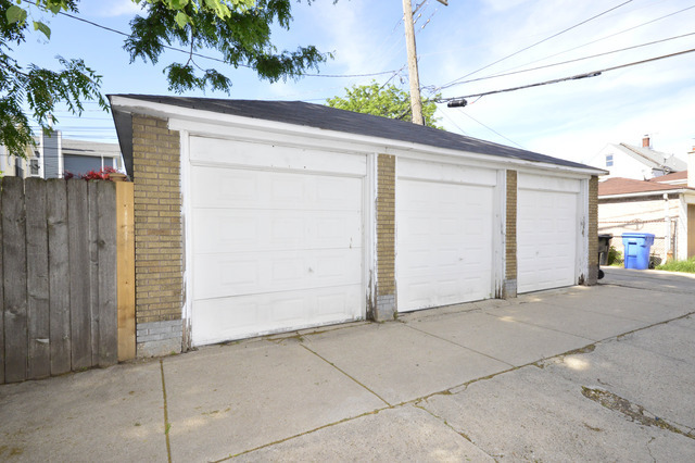 4101 North Bell Avenue, Unit 2 Chicago, IL 60618 - Photo 16 of 16 a view of a house with a garage