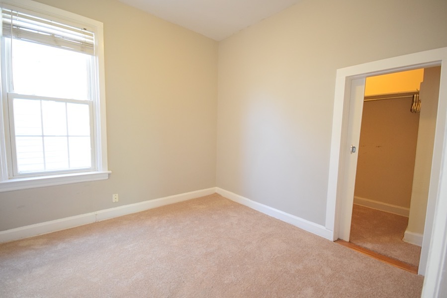 4101 North Bell Avenue, Unit 2 Chicago, IL 60618 - Photo 6 of 16 an empty room with a window