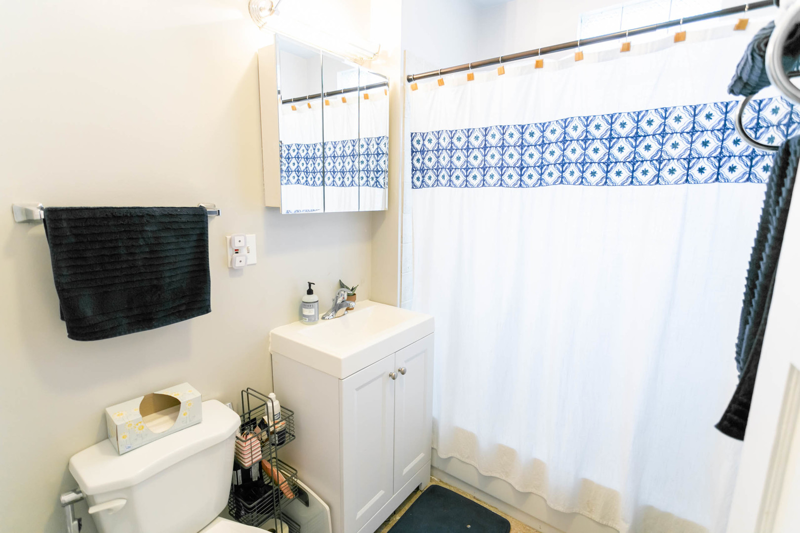 4101 North Bell Avenue, Unit 2 Chicago, IL 60618 - Photo 7 of 16 a bathroom with a sink toilet and shower
