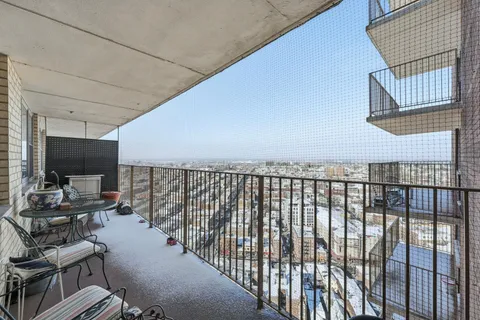 a balcony with furniture