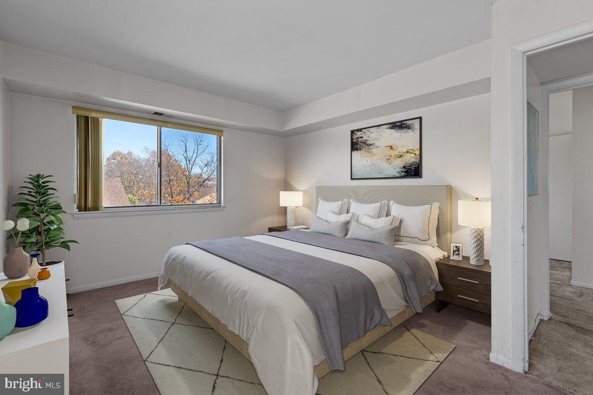 3166 Berry Road Northeast, Unit 27 Washington, DC 20018 - Photo 13 of 25 Serene bedroom with natural light and views.