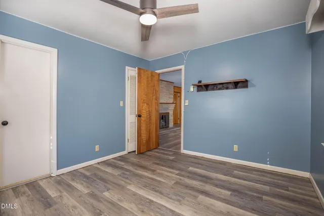 a bathroom with a shower and a toilet