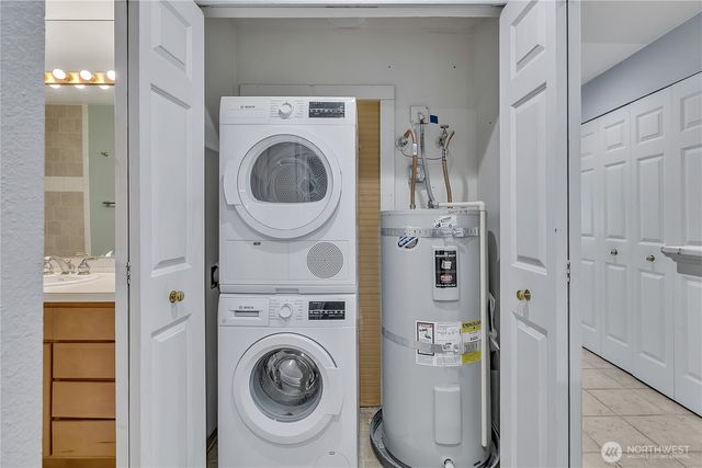 a view of a hallway with washer and dryer