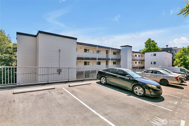 a car parked in front of a house
