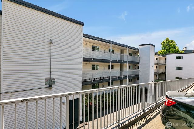 a front view of a building with large windows