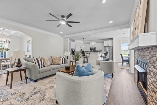 a fireplace with a hallway