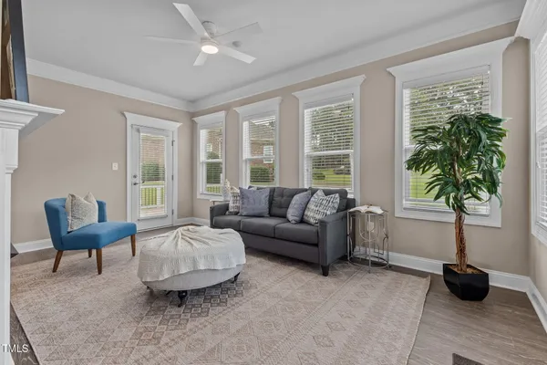 a bathroom with a granite countertop sink a toilet and a mirror