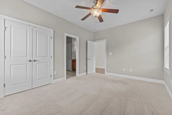 a view of a deck with wooden floor and outdoor space