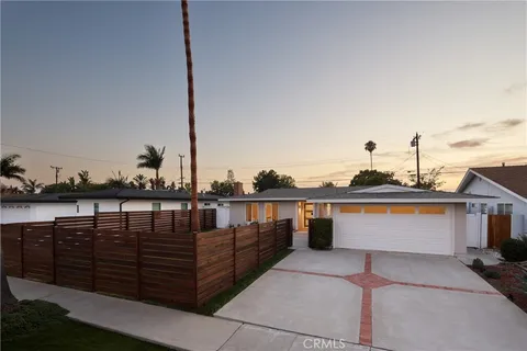 a view of a balcony with wooden floor