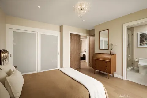 a bedroom with a bed and furniture
