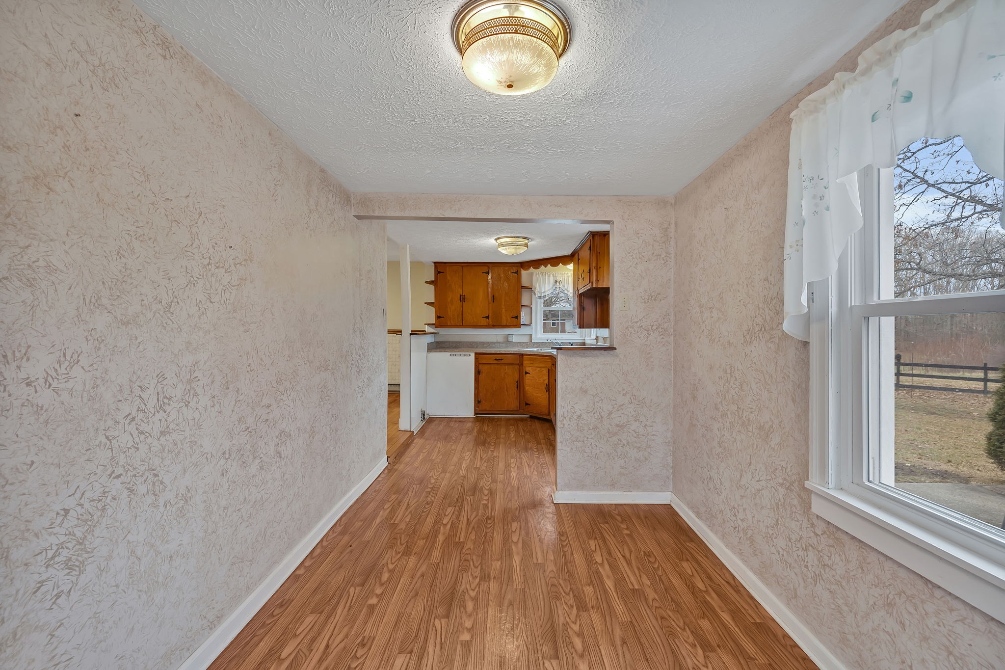 7203 Old Franklin Road Fairview, TN 37062 - Photo 17 of 43 a view of a kitchen from a hallway