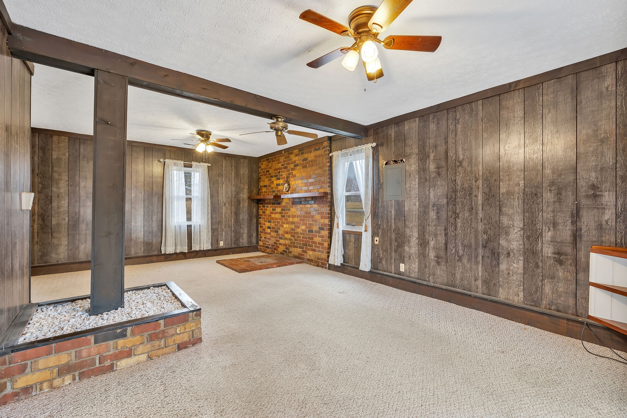 7203 Old Franklin Road Fairview, TN 37062 - Photo 29 of 43 a view of a hallway with a chandelier