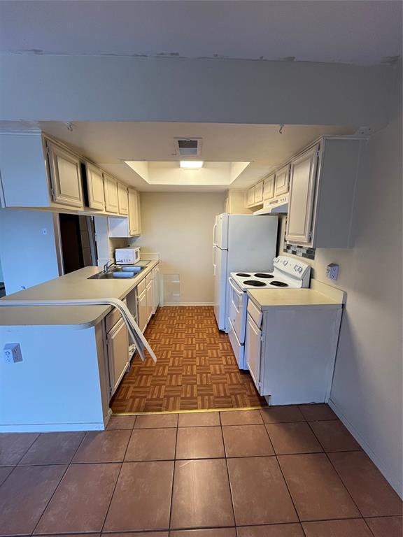 4460 Chaha Road, Unit 205 Garland, TX 75043 - Photo 7 of 27 a room with storage and utility