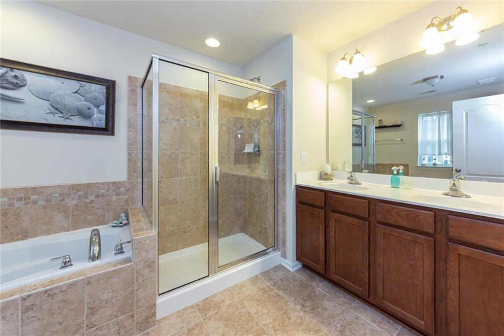 29 Truman Circle McKees Rocks, PA 15136 - Photo 12 of 24 Master bath offers a soaking tub and shower with a double bowl vanity