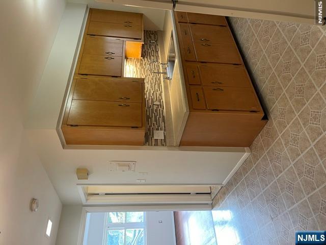 279 Chestnut Street Nutley, NJ 07110 - Photo 3 of 9 a view of a kitchen with a sink
