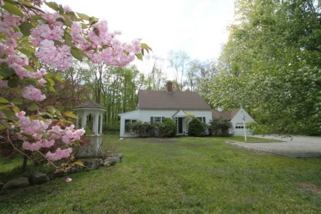 175 Georgetown Road Weston, CT 06883 - Photo 1 of 1 a view of a house with a yard