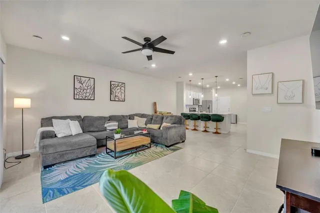 a bathroom with a sink and mirror with toilet
