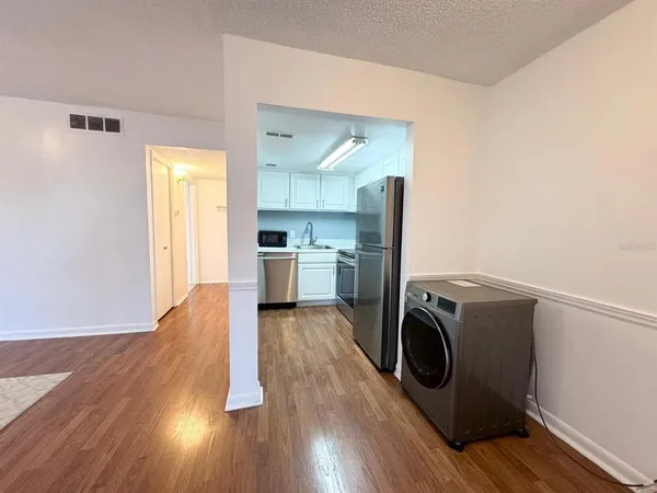a view of kitchen and utility room