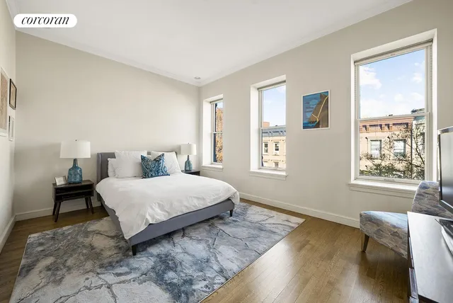 a bathroom with a sink toilet a mirror and shower