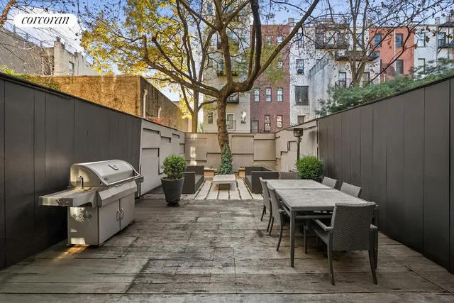 a view of a terrace with city view