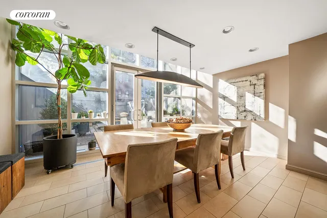 a kitchen with stainless steel appliances a stove sink microwave and cabinets