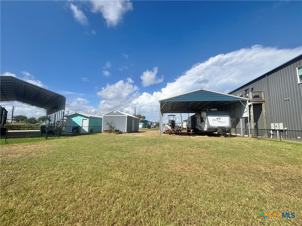 501 Maple Street Port O'Connor, TX 77982 - Photo 16 of 22 a view of a house with a yard