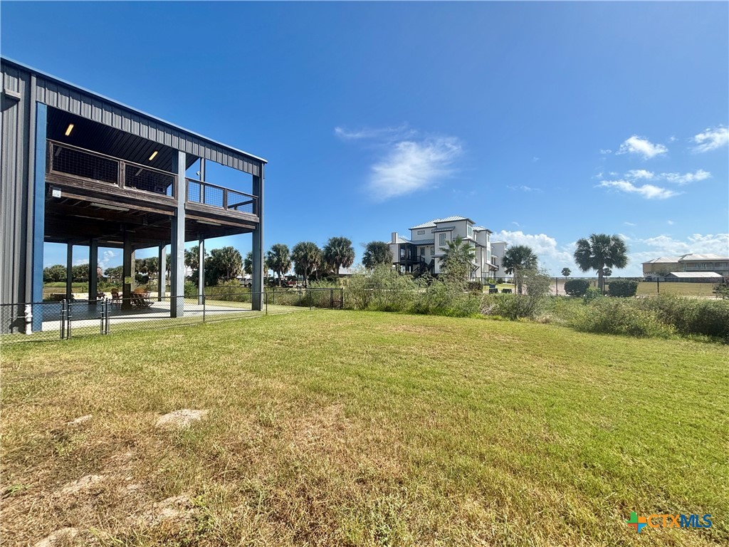501 Maple Street Port O'Connor, TX 77982 - Photo 18 of 22 a view of a house with a yard