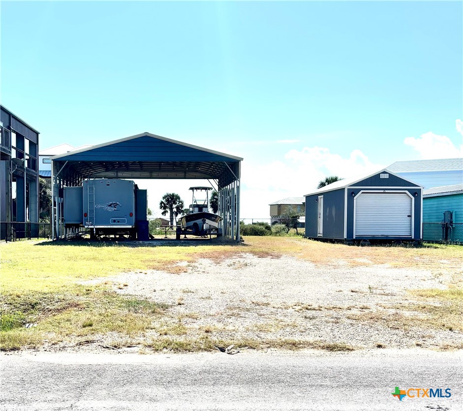 501 Maple Street Port O'Connor, TX 77982 - Photo 9 of 22 a view of a house with a yard
