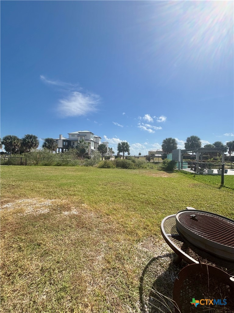 501 Maple Street Port O'Connor, TX 77982 - Photo 10 of 22 a view of a lake with a yard