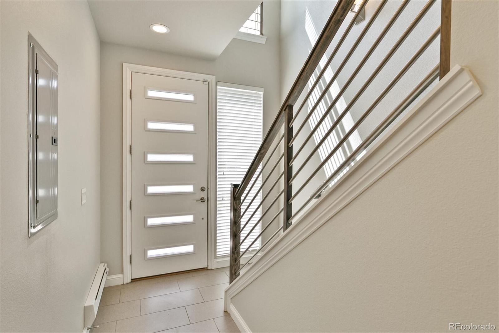 1014 Acoma Street Denver, CO 80204 - Photo 6 of 35 a view of a hallway with a elevator