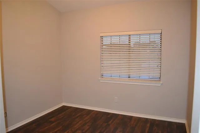 a front view of a house with garage